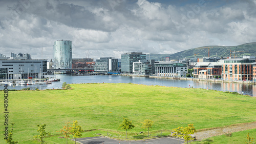 Elevated view on Belfast city quays, harbour and marina with tall modern buildings in the background, UK, Northern Ireland