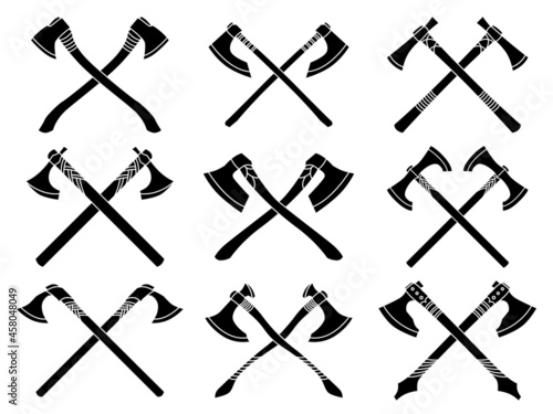 Set of simple monochrome vector images of crossed medieval axes and hatchets.