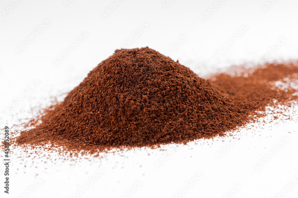 Pile of coffee powder isolated on white Pile of coffee powder isolated on white