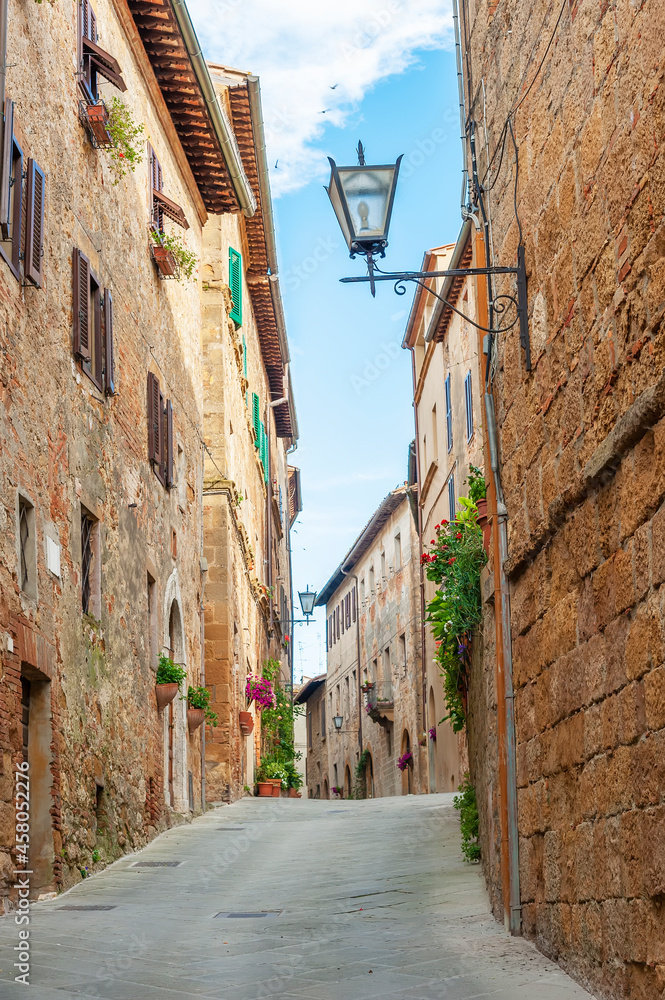 Alley in historical village Pienza in Tuscany, Italy