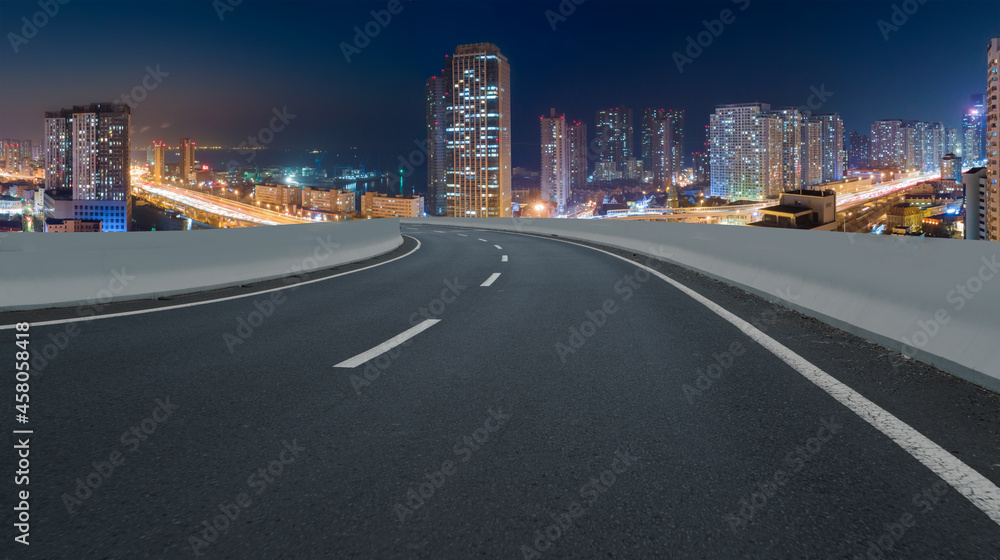 Fototapeta premium Panoramic skyline and empty asphalt road with modern buildings