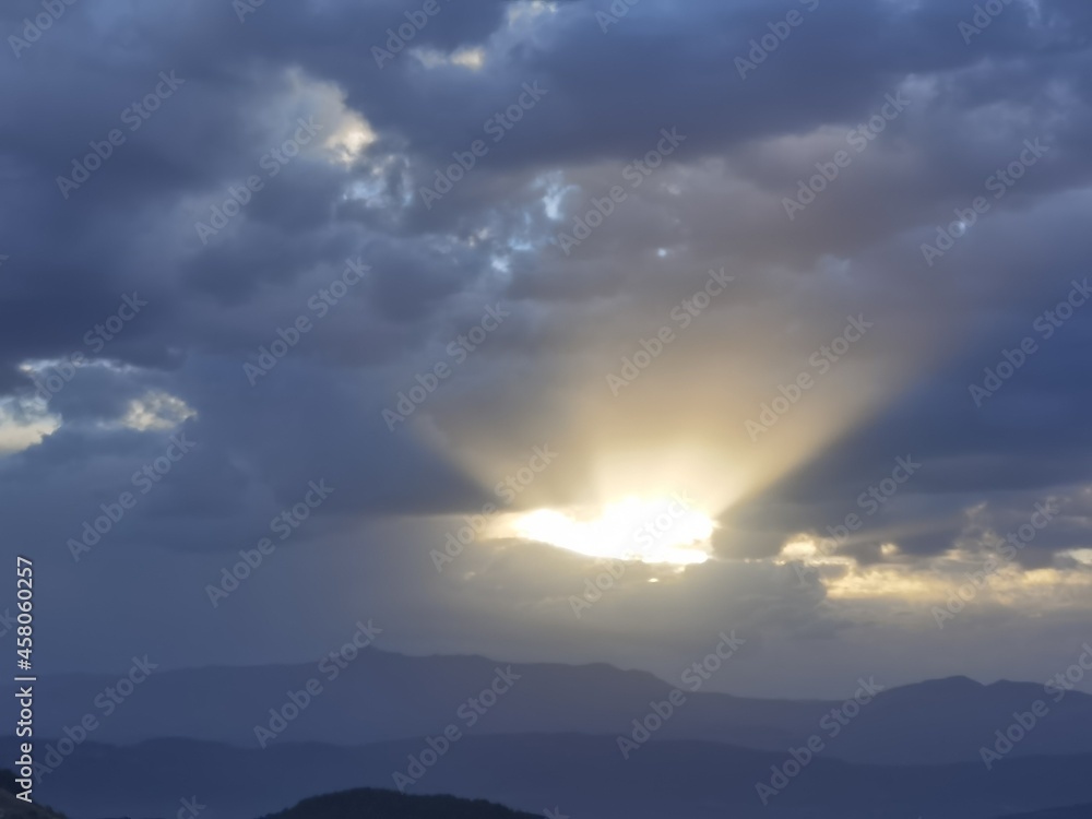 sun among clouds light curtains diffuse background