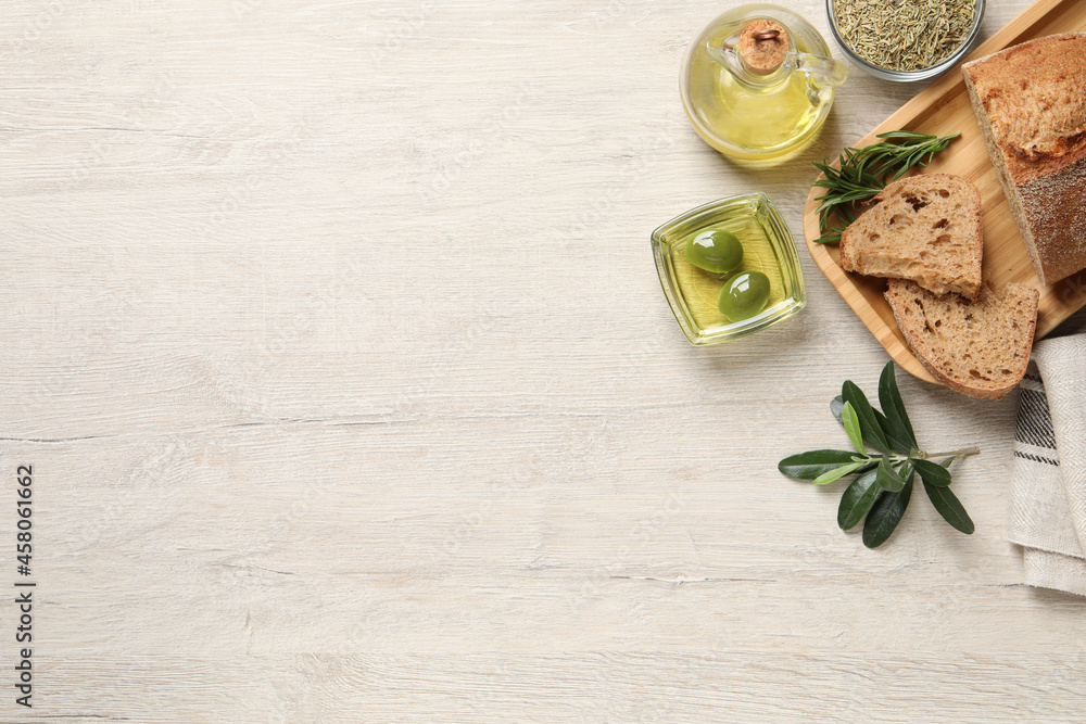 Flat lay composition with olive oil on wooden table, flat lay. Space for text Flat lay composition with olive oil on wooden table, flat lay. Space for text