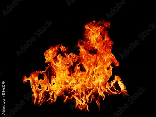 Flame Flame Texture For Strange Shape Fire Background Flame meat that is burned from the stove or from cooking. danger feeling abstract black background Suitable for banners or advertisements.