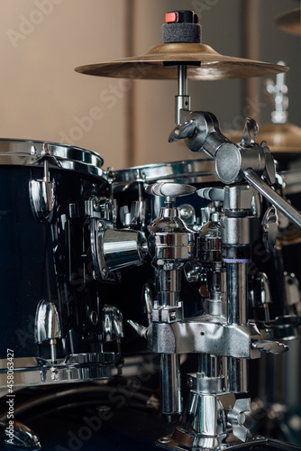 Mounts and splash cymbal in a drum kit.