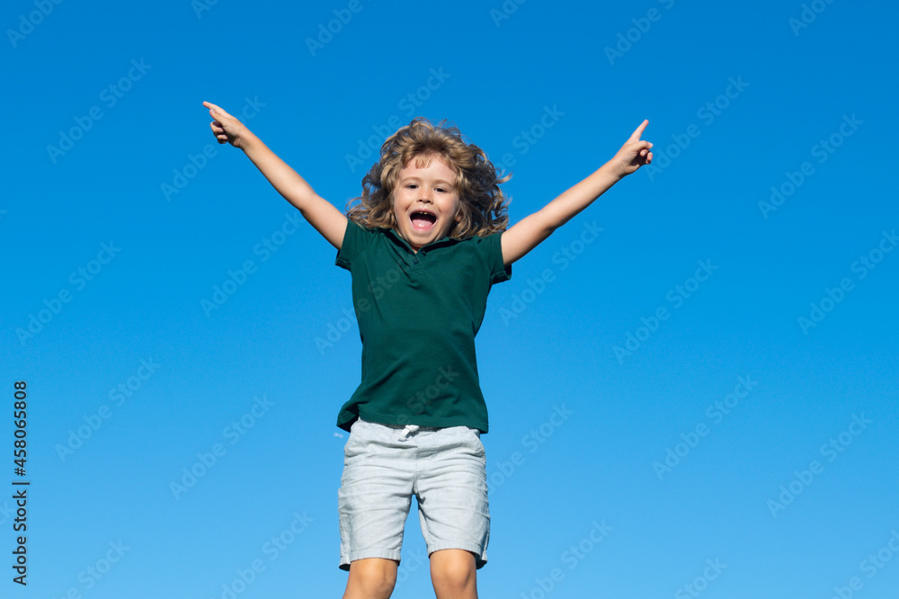 Portrait of a excited little boy on blue sky in the park. Portrait of a excited little boy on blue sky in the park.