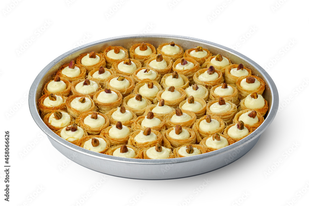 Assortment of Turkish baklava dessert in metal tray isolated on white Assortment of Turkish baklava dessert in metal tray isolated on white