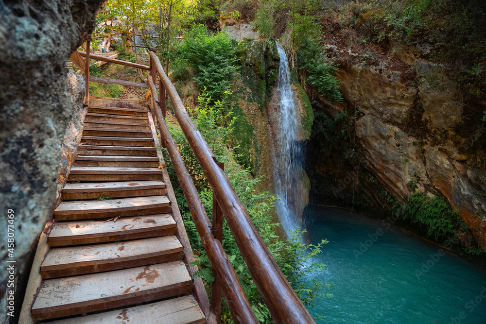Obraz premium Beautiful waterfalls Degirmendere Selalesi in the nature of Side in Turkey with beautiful colors in the rocks. GIZLI CENNET