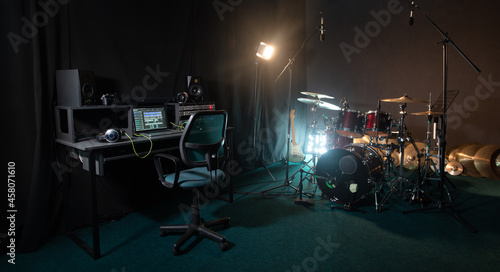 Recording studio with drum kit.