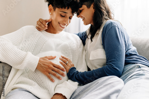 Obraz na płótnie Pregnant female couple bonding at home