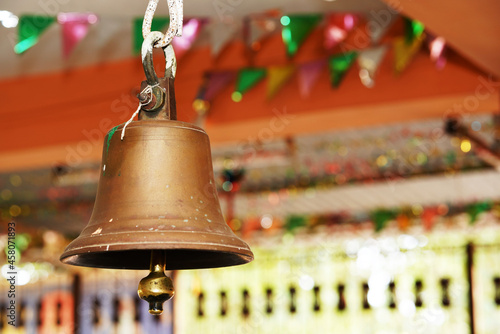 Brass made bell for Worshiping God in Indian Temple, Hindu Temple Bell Closeup,  Ringing bells - Selective focus photo
