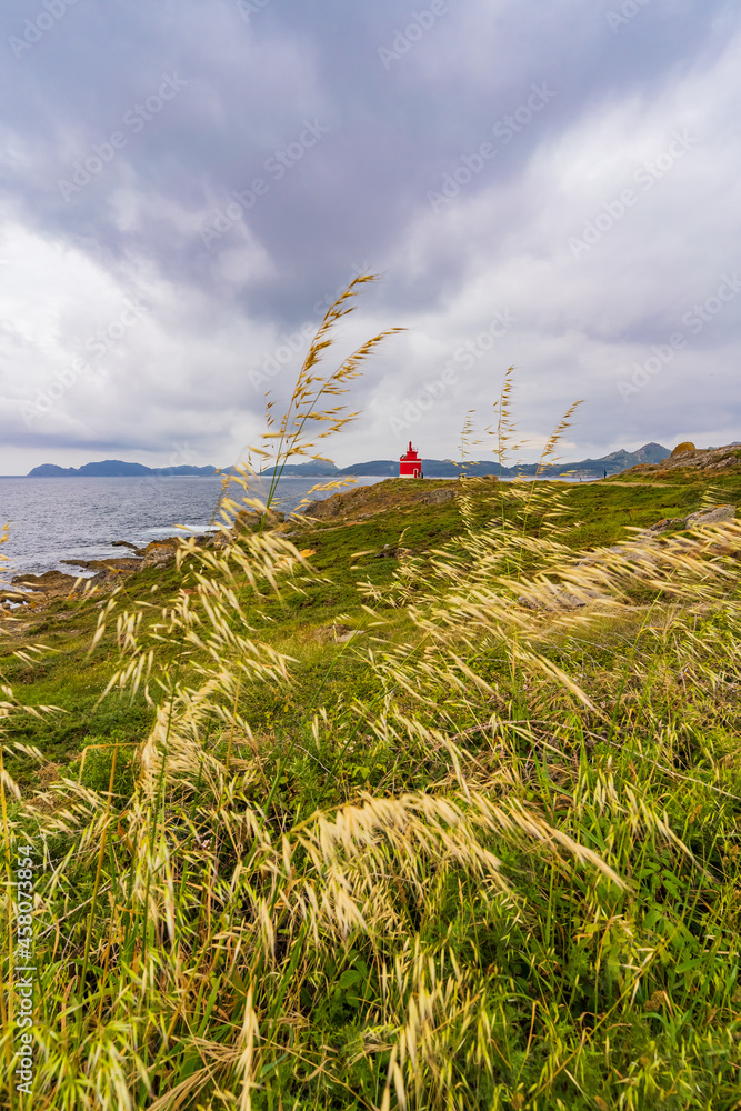 Cabo Home lighthouse under cloudy skies