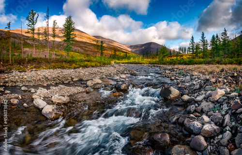 mountain river in autumn. Platue putorana.