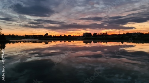 evening on the lake with beautiful reflections of clouds