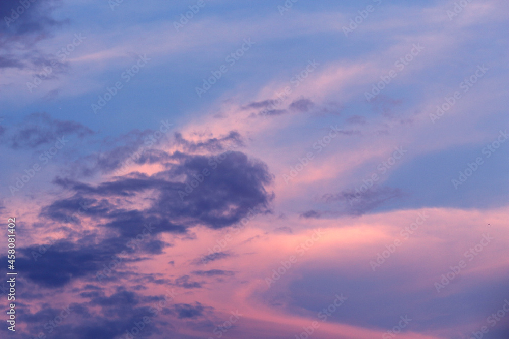 Beautiful sunset sky background with cloud, selective focus with blur.
