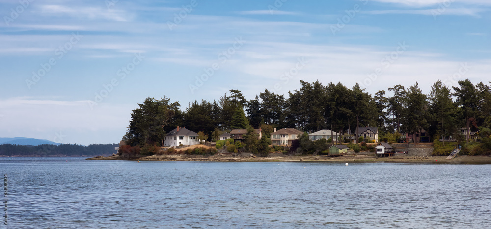 View of a scenic shore on the west coast of pacific ocean during a sunny summer day. Roberts Bay, Sidney, Vancouver Island, British Columbia, Canada.