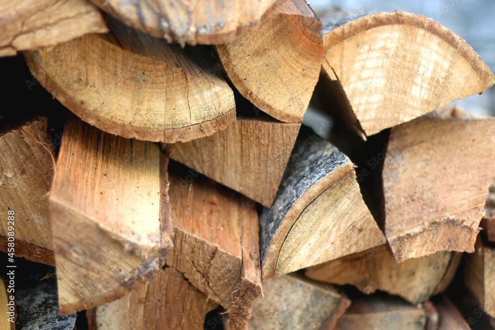 Fototapeta premium Stack of wood logs. Selective focus.