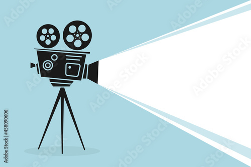 Detailed silhouette of vintage cinema projector or camcorder on a tripod. Cinema background. Old film projector with place for your text. Movie festival template for banner, flyer, poster or tickets. photo