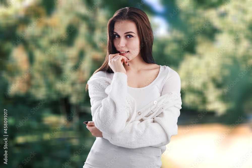 Portrait of a young woman breathing fresh air in a forest Portrait of a young woman breathing fresh air in a forest