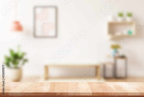 Fotografiet empty brown wooden table for product display montage with blur living room inter