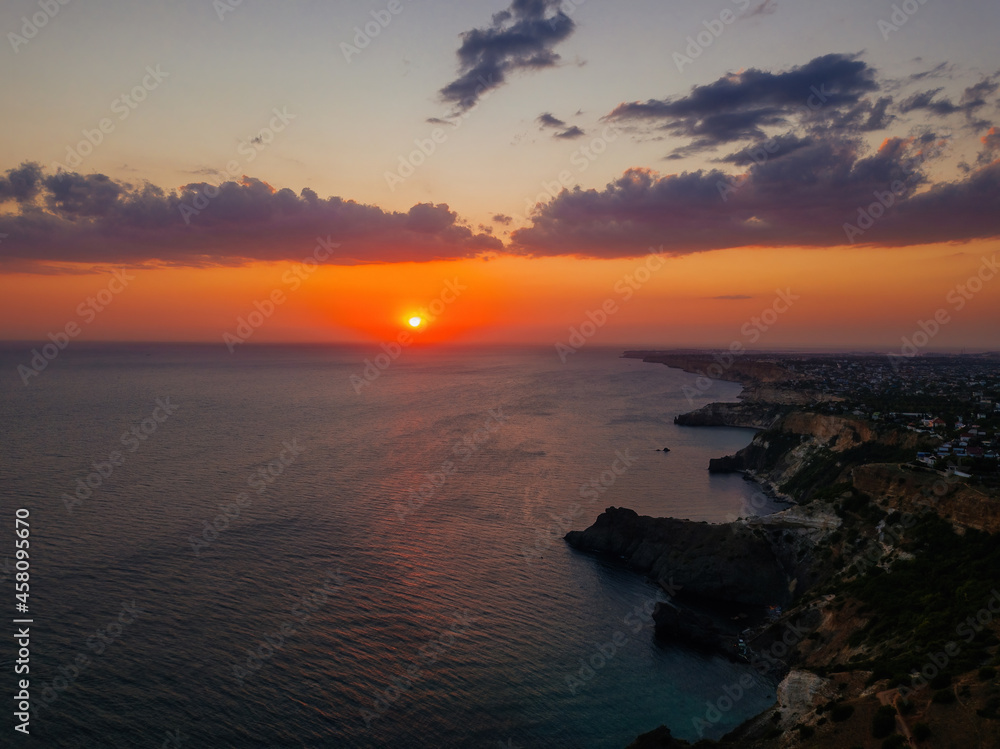Beautiful sunset on a Black sea coast in Crimea, Cape Fiolent