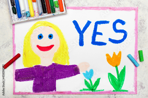 Colorful drawing: smiling blond girl and word YES