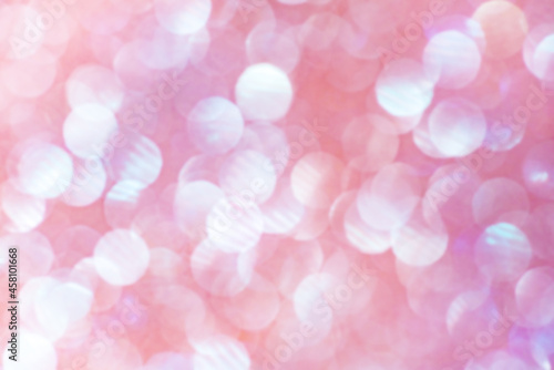 Defocus light pink and white glitter. Abstract light background.