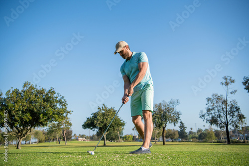 professional sport outdoor. male golf player on professional golf course.