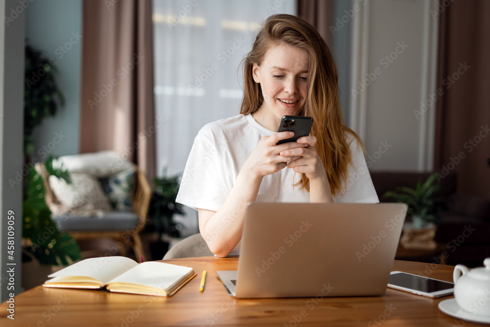 The student does his lessons remotely on a laptop. A freelance economist works online at home at the workplace. Housewife surfing the internet. Fills out an application to the bank for a loan. The student does his lessons remotely on a laptop. A freelance economist works online at home at the workplace. Housewife surfing the internet. Fills out an application to the bank for a loan.
