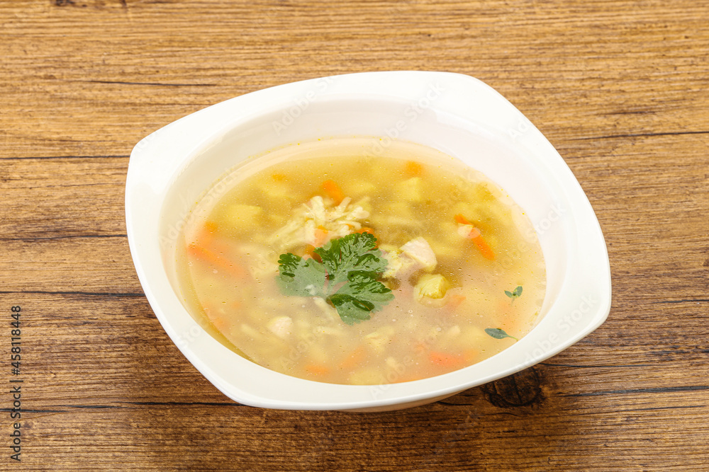 Tasty chicken soup with carrot Tasty chicken soup with carrot