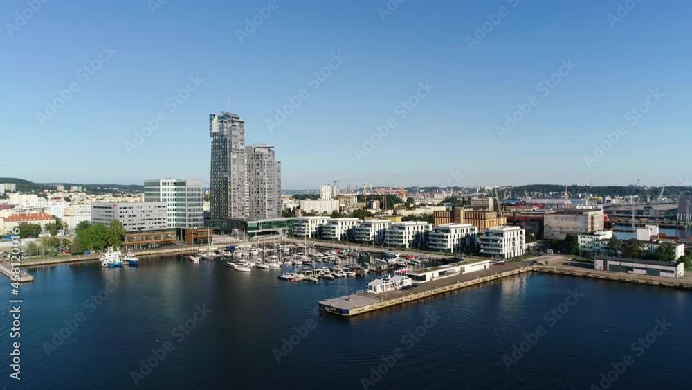 Aerial view of port full of white yachts and sailboats in a modern seaside city, Gdynia. Marina with boats, at summer sunny day. Monaco, France, Croatia, Italy, Fort Lauderdale, Greece. Aerial view of port full of white yachts and sailboats in a modern seaside city, Gdynia. Marina with boats, at summer sunny day. Monaco, France, Croatia, Italy, Fort Lauderdale, Greece.