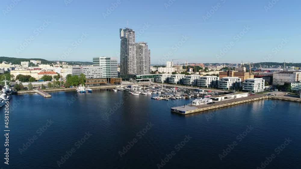 Aerial view of port full of white yachts and sailboats in a modern seaside city, Gdynia. Marina with boats, at summer sunny day. Monaco, France, Croatia, Italy, Fort Lauderdale, Greece. Aerial view of port full of white yachts and sailboats in a modern seaside city, Gdynia. Marina with boats, at summer sunny day. Monaco, France, Croatia, Italy, Fort Lauderdale, Greece.