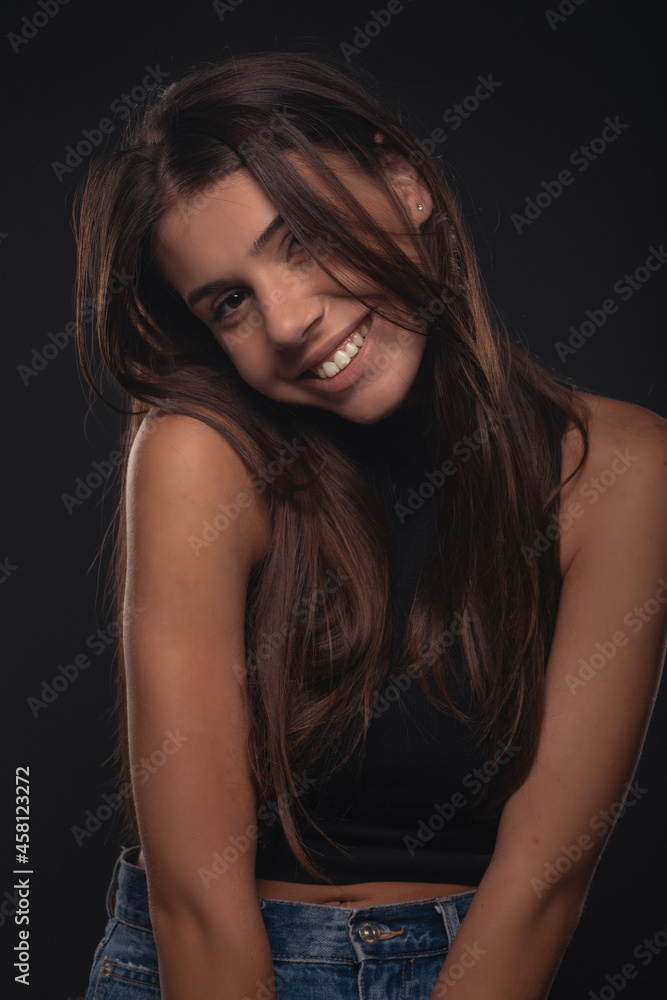 Portrait of a girl being cute while smiling and posing Portrait of a girl being cute while smiling and posing