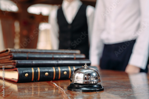 Hotel service bell Concept hotel, travel, room,Modern luxury hotel reception counter desk on background.