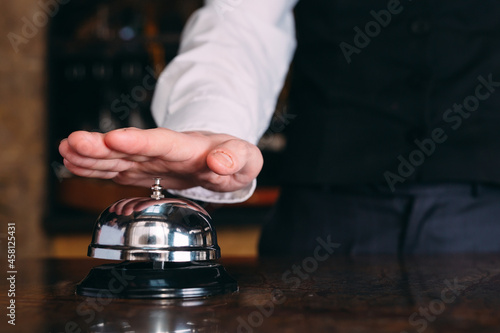 Restaurant bell vintage with hand .