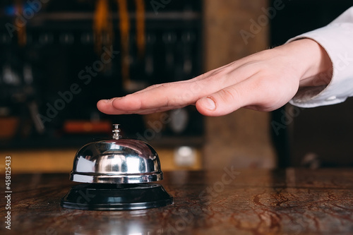Restaurant bell vintage with hand .