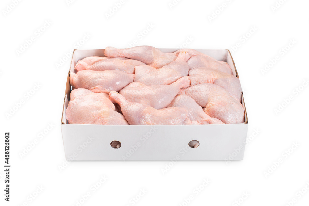 Fresh chicken leg with skin many pieces close-up in a cardboard box for a supermarket, retail. Raw chicken meat. Fresh chicken leg with skin many pieces close-up in a cardboard box for a supermarket, retail. Raw chicken meat.