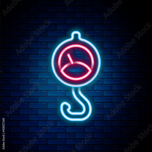 Glowing neon line Spring scale icon isolated on brick wall background. Balance for weighing. Determination of weight. Colorful outline concept. Vector