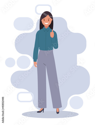 A happy woman gives a thumbs up. The gesture is cool.