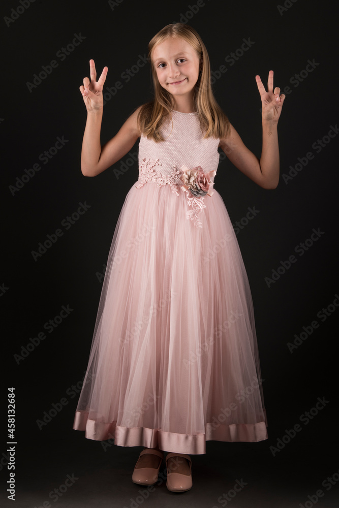 Little beautiful and cute girl child in a fashionable festive dress Little beautiful and cute girl child in a fashionable festive dress