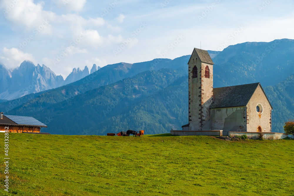 Santa Maddalena is a charming mountain village in the Val di Funes valley with the Odle Mountains in the background, Trentino-Alto Adige, Province of Bolzano, South Tyrol