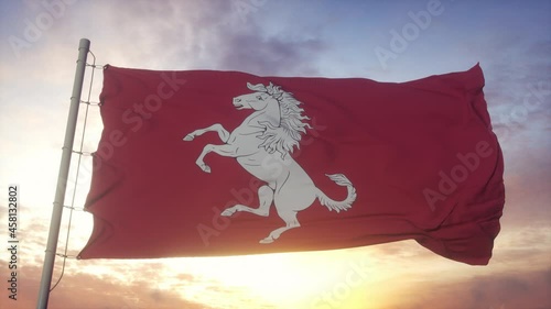 Kent flag, England, waving in the wind, sky and sun background photo