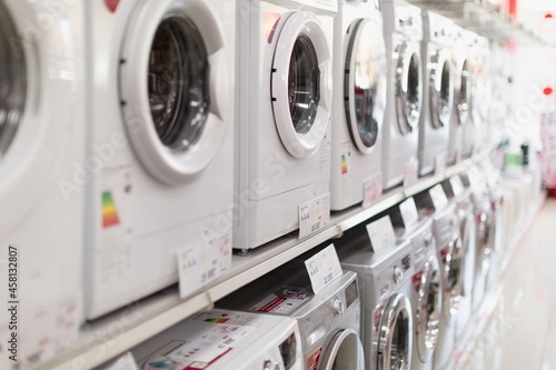 Washing machines, refrigerators and other home related appliance or equipment in the retail store photo