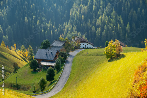 Church of Santa Barbara during the day in the cozy little village of La Valle, Alta Badia, South Tyrol photo