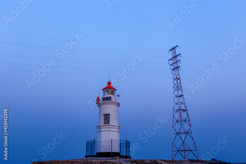 November, 2017 - Vladivostok, Primorsky region - Tokarevsky lighthouse in Vladivostok against the background of a beautiful evening sky. Filmed from below.