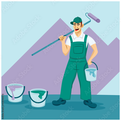 Male painter holding paint roller next to paint buckets