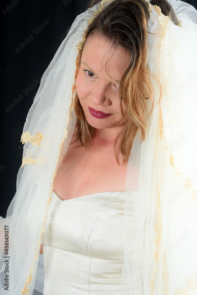 blonde girl dressed in white wedding dress, outfit made by seamstress hand embroidered black and white photography on black background blonde girl dressed in white wedding dress, outfit made by seamstress hand embroidered black and white photography on black background