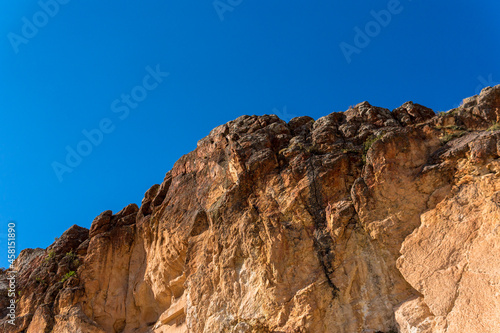 Mountain. a mountain with brown and dark brown tones. The harmony of blue sky and unique rocks