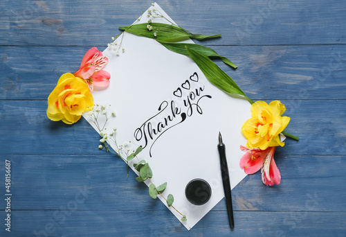 Paper with text THANK YOU, ...