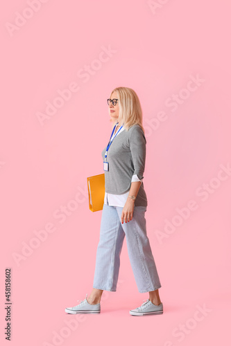 Mature businesswoman on col...